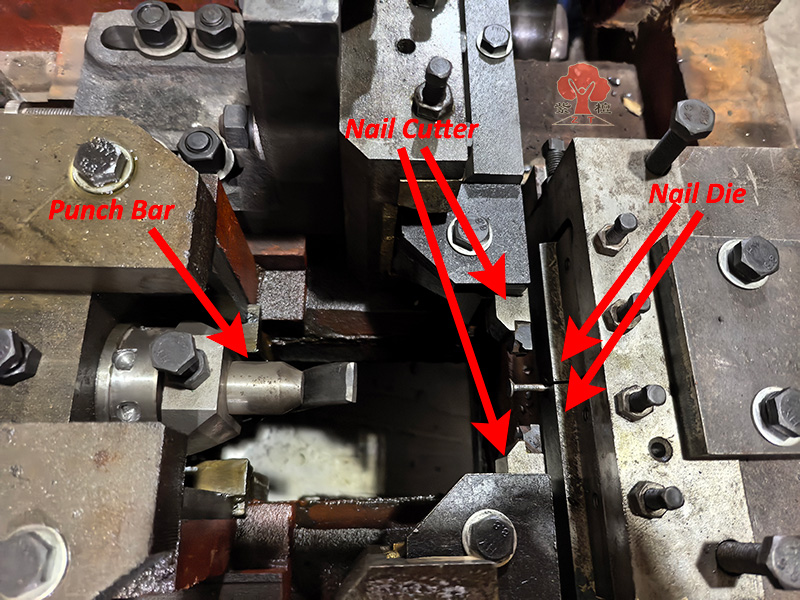 nail machine parts in use